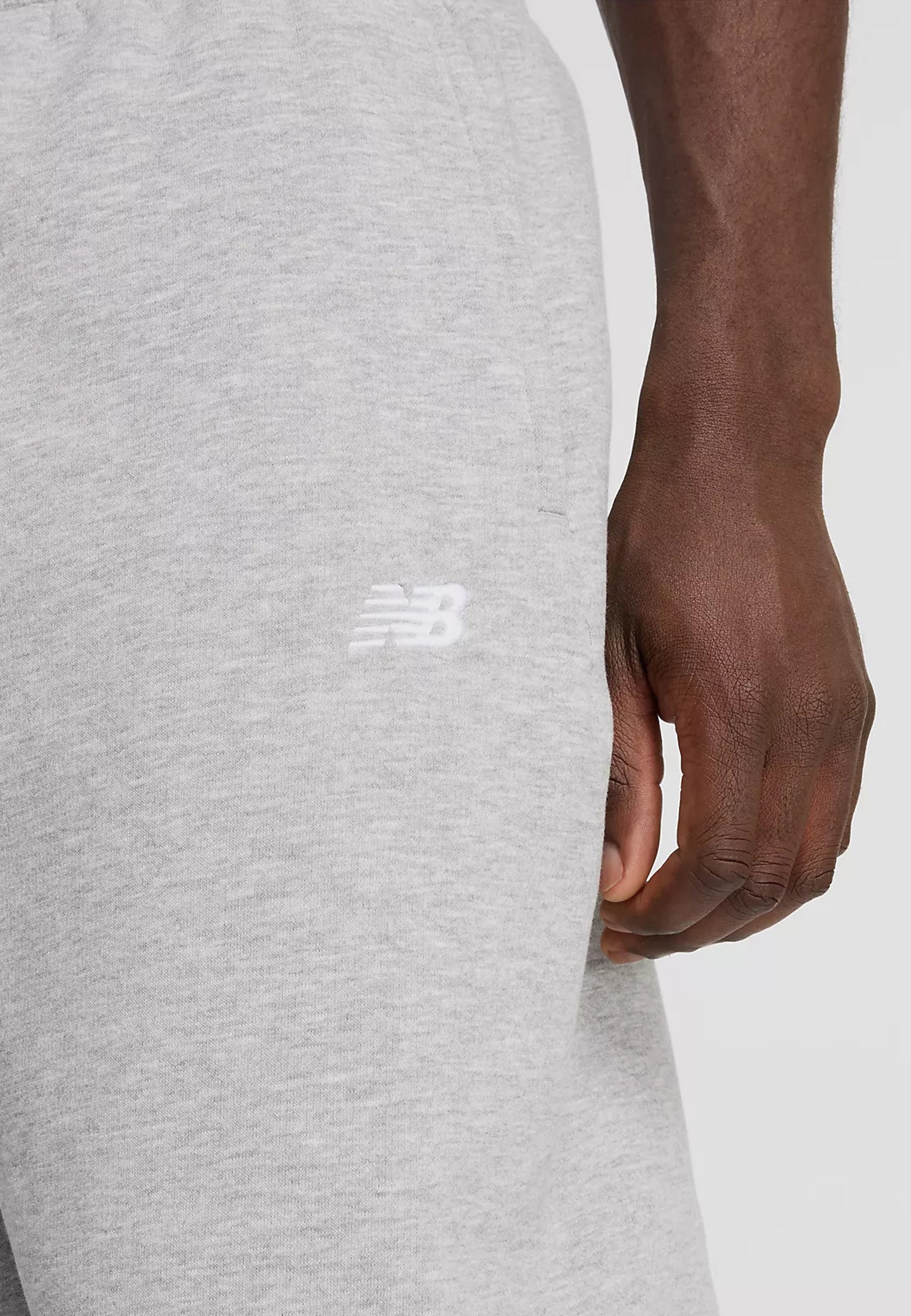Pantaloni tuta jogger sportivi grigi Essentials New Balance A26 MP41503AG // NEW BALANCE 